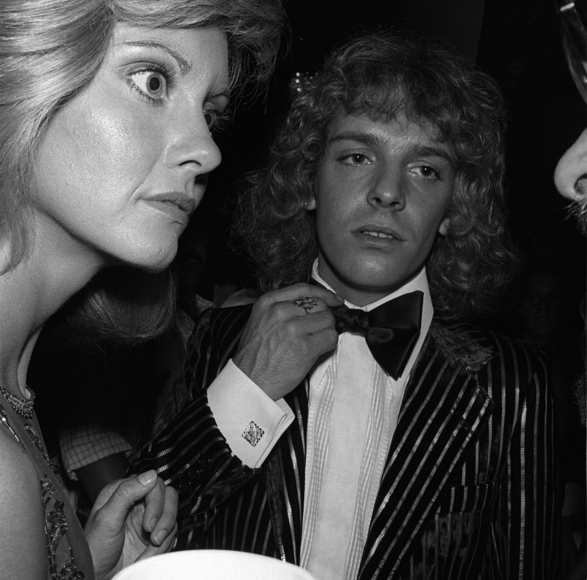 Olivia Newton-John and Peter Frampton backstage at an awards show in Los Angeles, California 1980