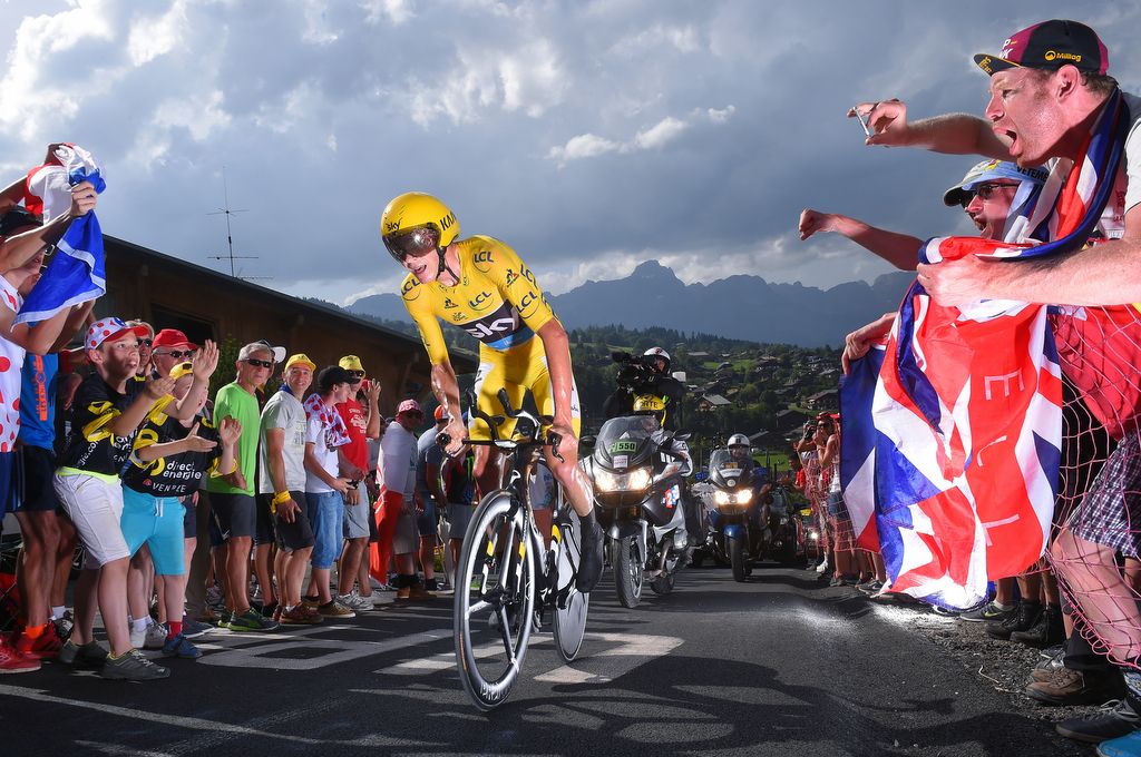 Chris Froome (Team Sky) rides through the large crowds