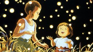 Two siblings surrounded by fireflies