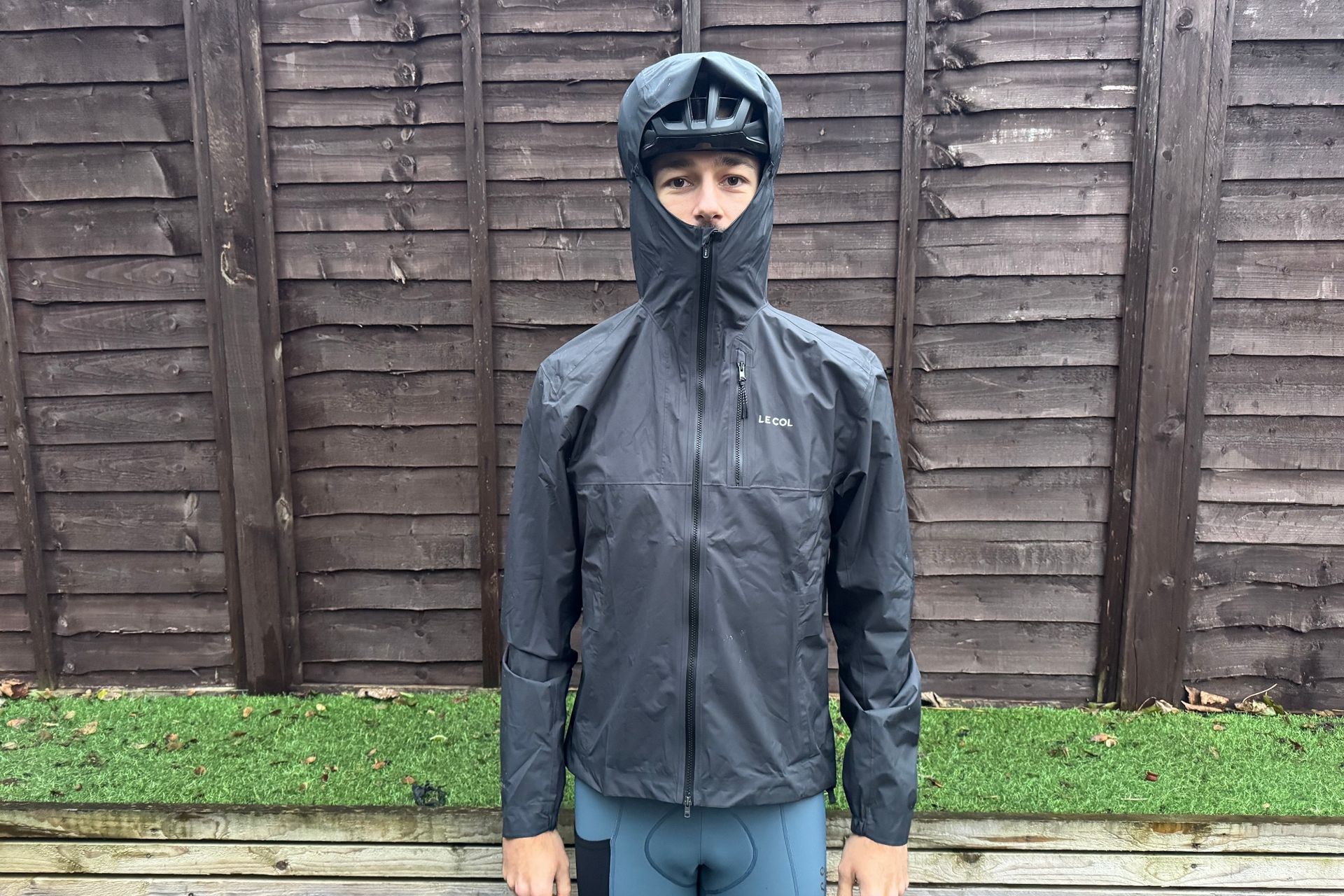 Le Col ARC gravel jacket with the hood up
