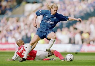 Emmanuel Petit of Chelsea goes past Sylvain Wiltord of Arsenal during the FA Barclaycard Premiership match between Arsenal and Chelsea at Stamford Bridge in London. The game ended 1-1.