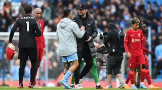 Gabriel Jesus of Manchester City and Liverpool manager Jurgen Klopp shake hands after the Premier League match between Manchester City and Liverpool on 10 April, 2022 at the Etihad Stadium, Manchester, United Kingdom