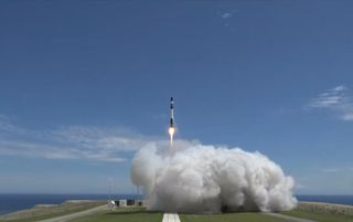 A Rocket Lab Electron booster launches on the company's second test flight, called "Still Testing," from the company's Māhia Peninsula launch site in New Zealand on Jan. 21, 2018 local time. The Electron rocket carried three small satellites into orbit for Rocket Lab customers.