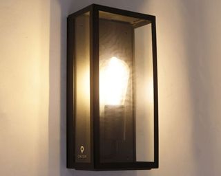 Industrial outdoor wall lamp black IP44 with glass - Rotterdam lit up on wall