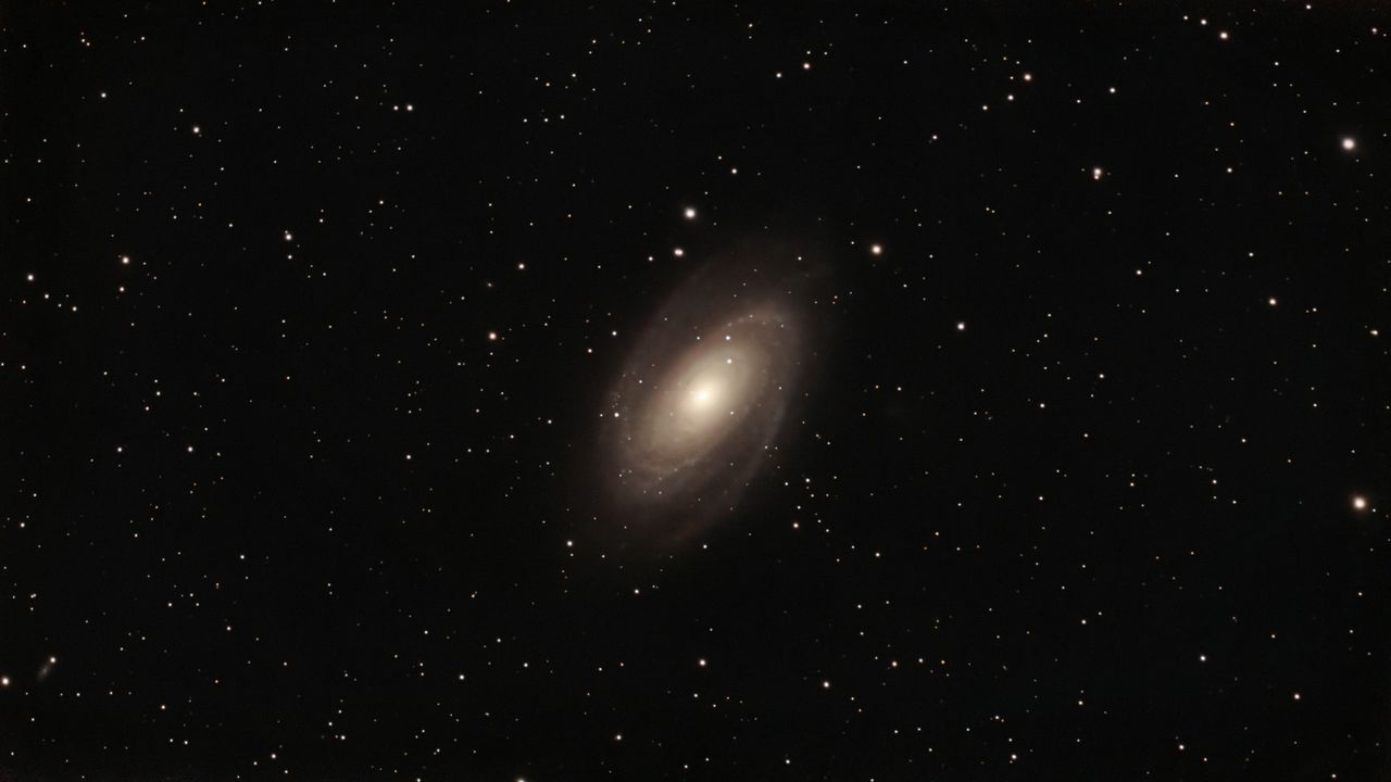 swirls of gas on a starry background