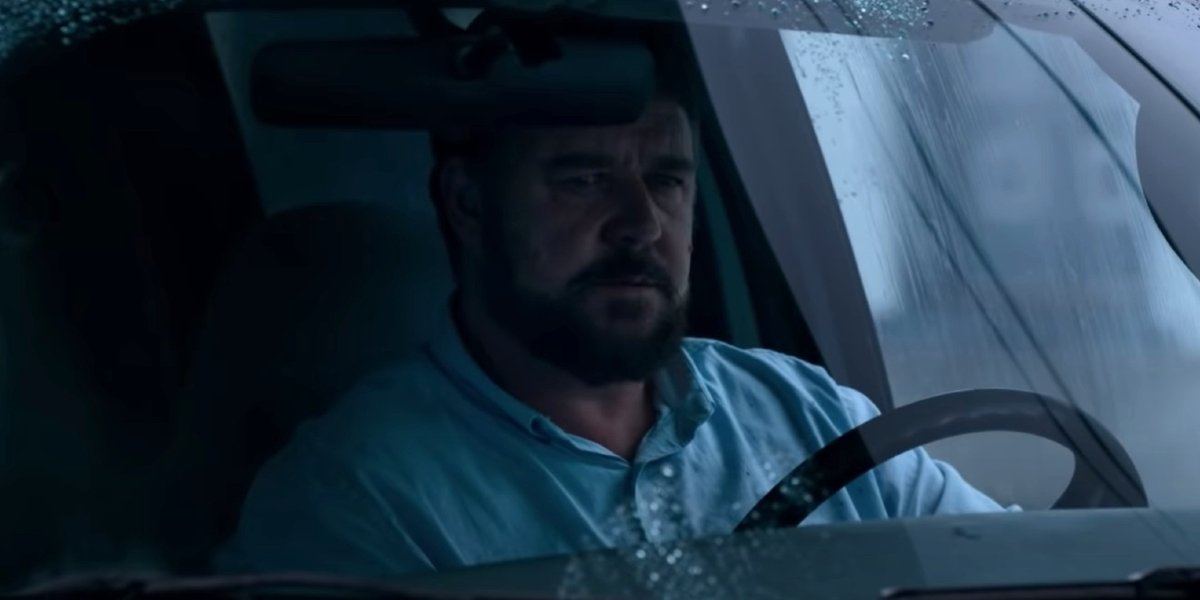 Unhinged Russell Crowe sits in his truck with anger