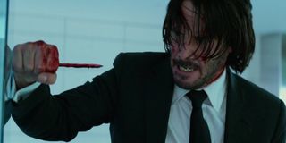 John Wick with bloody pencil