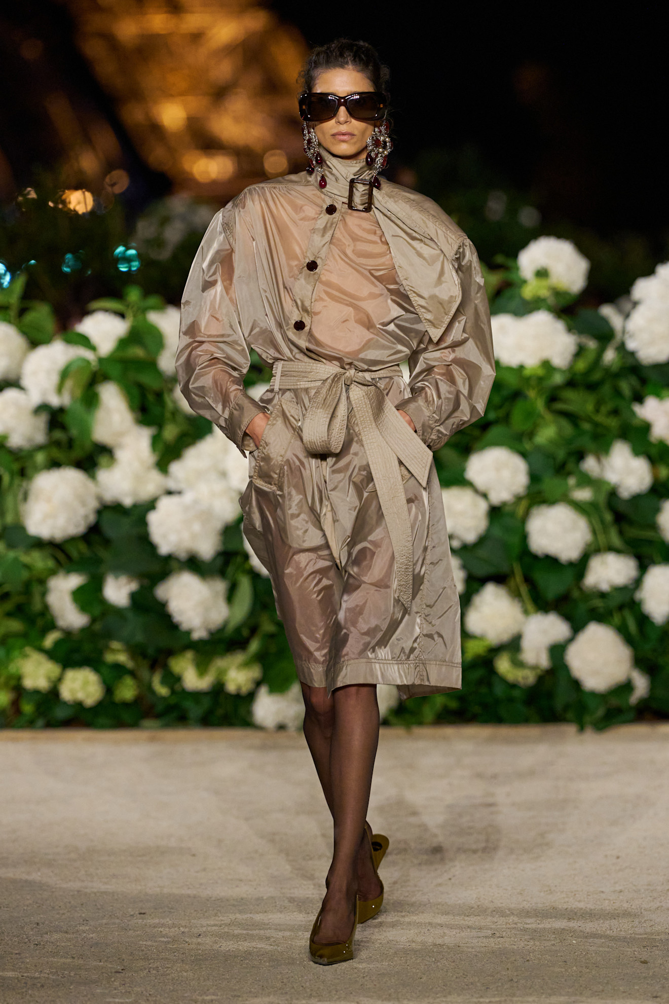 A model wore Teyana Taylor's semi-sheer trench coat on the Saint Laurent Spring 2026 runway