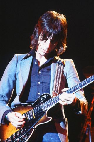 Jeff Beck performs on stage in Tokyo, Japan, December 1978. He is playing a Roland GS-500 Guitar Synth.