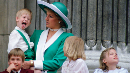 Prince Harry Sticking His Tongue Out Much To The Suprise Of His Mother, Princess Diana At Trooping The Colour With Prince William, Lady Gabriella Windsor And Lady Rose Windsor Watching From The Balcony Of Buckingham Palace