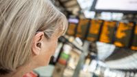 Hearing disabled people using Ampetronic | Listen Technologies solutions at Brighton Station. 