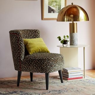 living room with leopard print chair