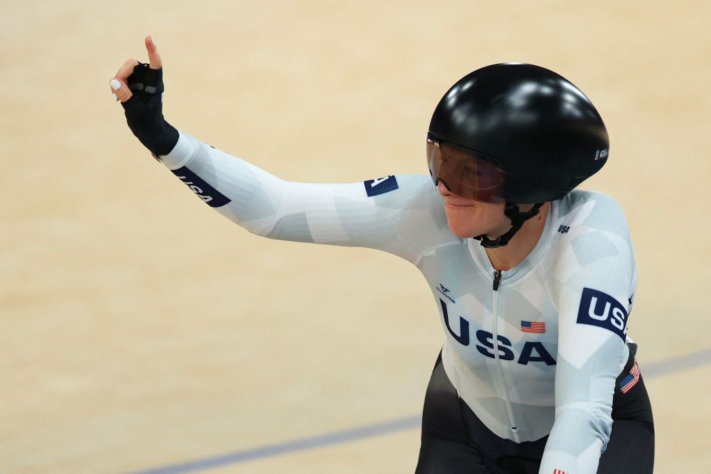 US' Jennifer Valente celebrates winning the women's track cycling omnium event of the Paris 2024 Olympic Games at the Saint-Quentin-en-Yvelines National Velodrome in Montigny-le-Bretonneux, south-west of Paris, on August 11, 2024. (Photo by Emmanuel DUNAND / AFP)