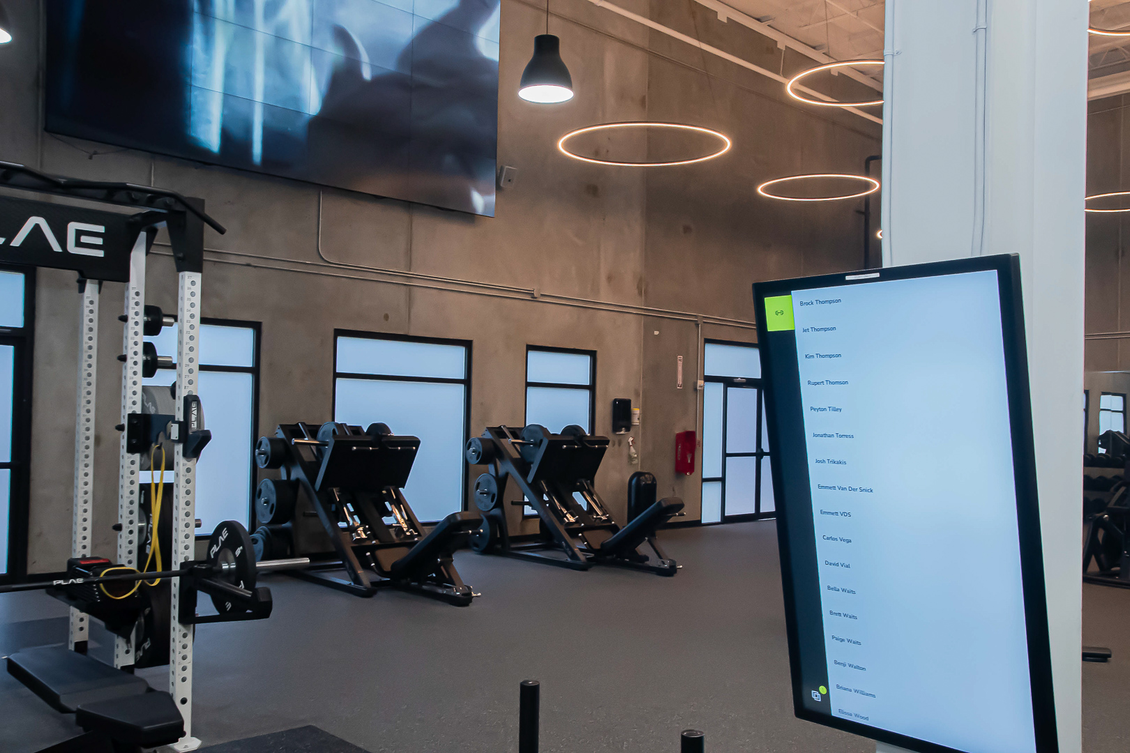 FITNESS2020 gyms are donned with displays of instructors leading workouts.