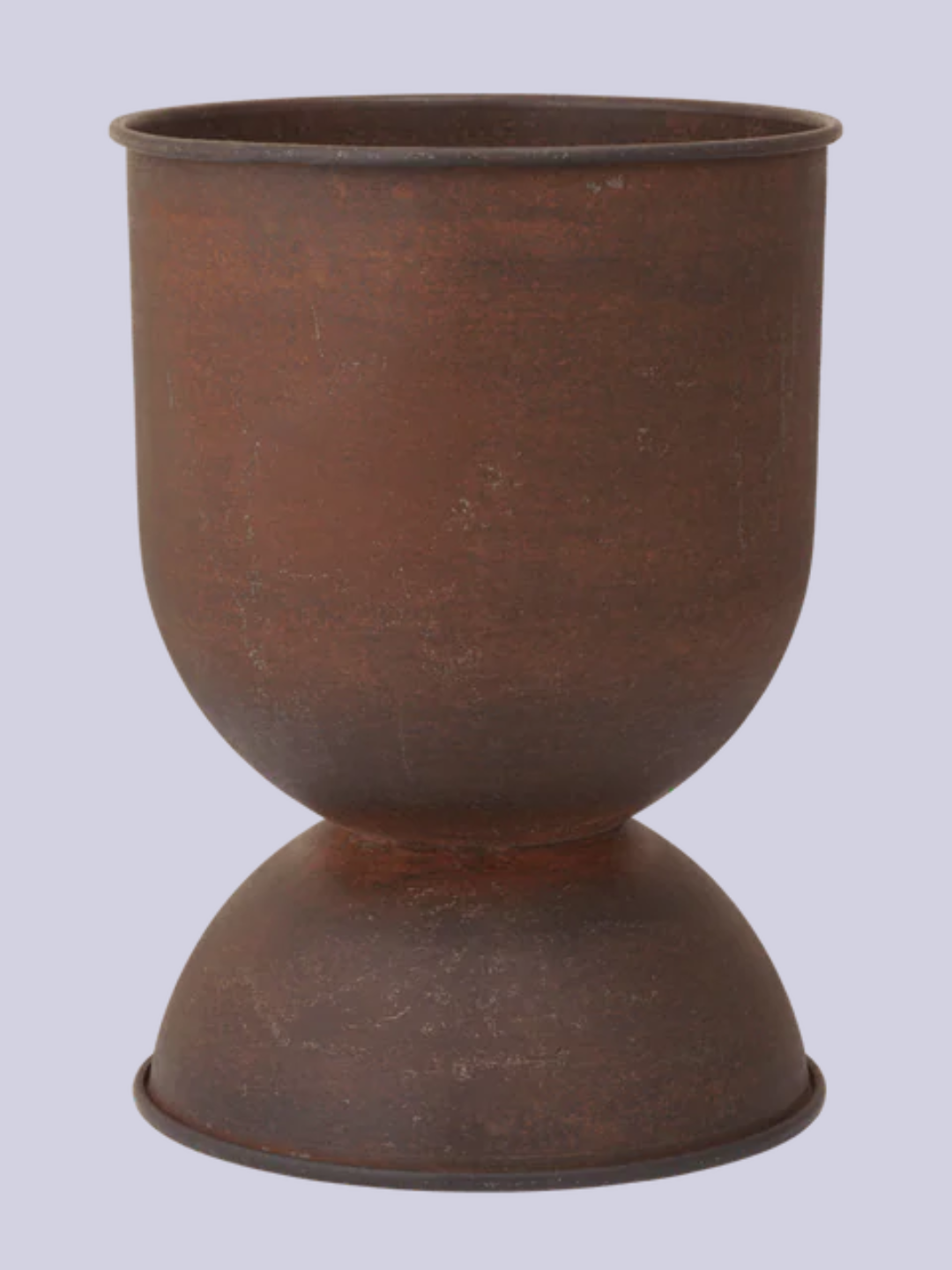 A rust-colored footed planter