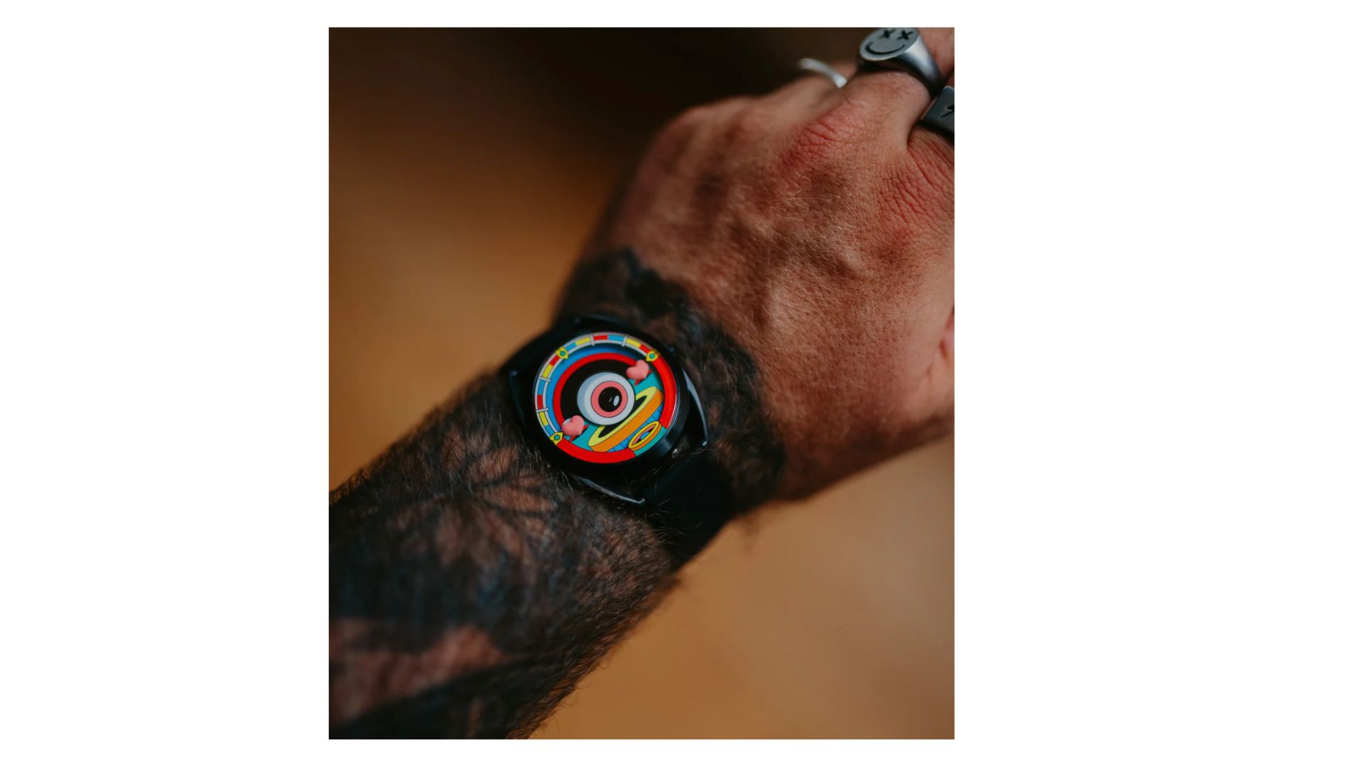 an image of the eyecon watch worn on a man's wrist.