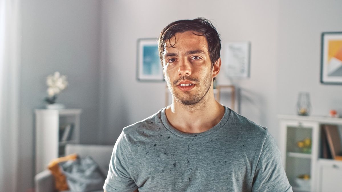 Man looking sweaty after home workout