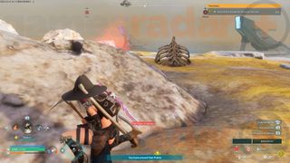 A player stealths behind a rock waiting for the right time to mine Ancient Bone in Palworld.