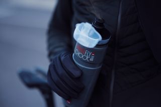 Elite nanofly bottle held by cyclist