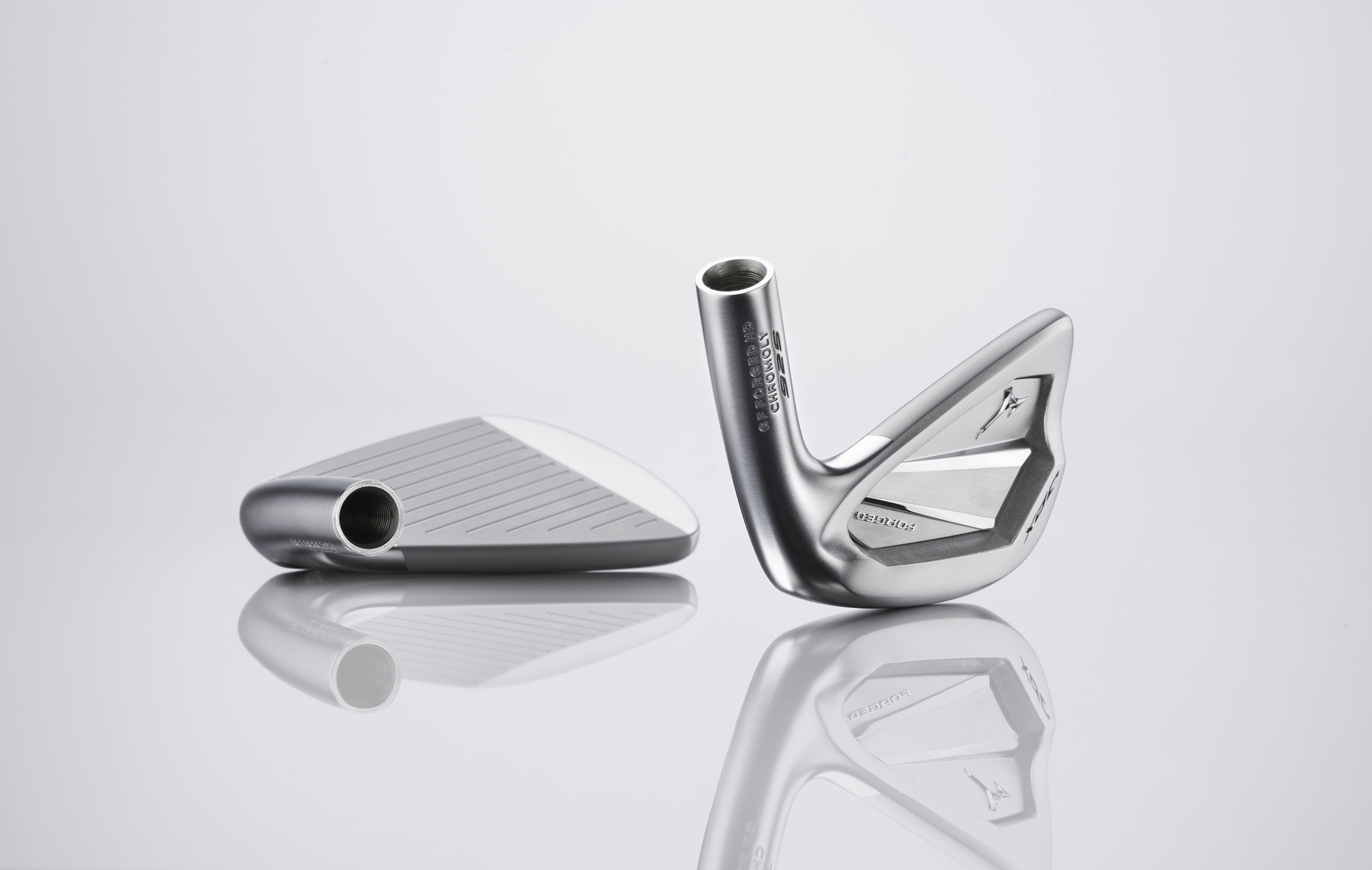 Two Mizuno JPX 925 Forged iron heads