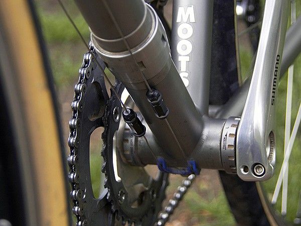 Cable connectors allow the front and rear halves of the bike to fully separate for packing.