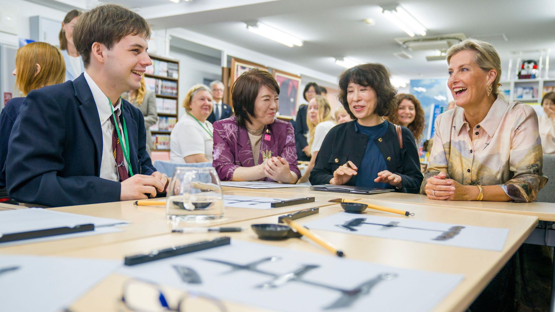 The Duchess of Edinburgh speaks to Daniel Zahorodniy (left), aged 16, from Ukraine, at the Ukraine Mental Health Exchange Center