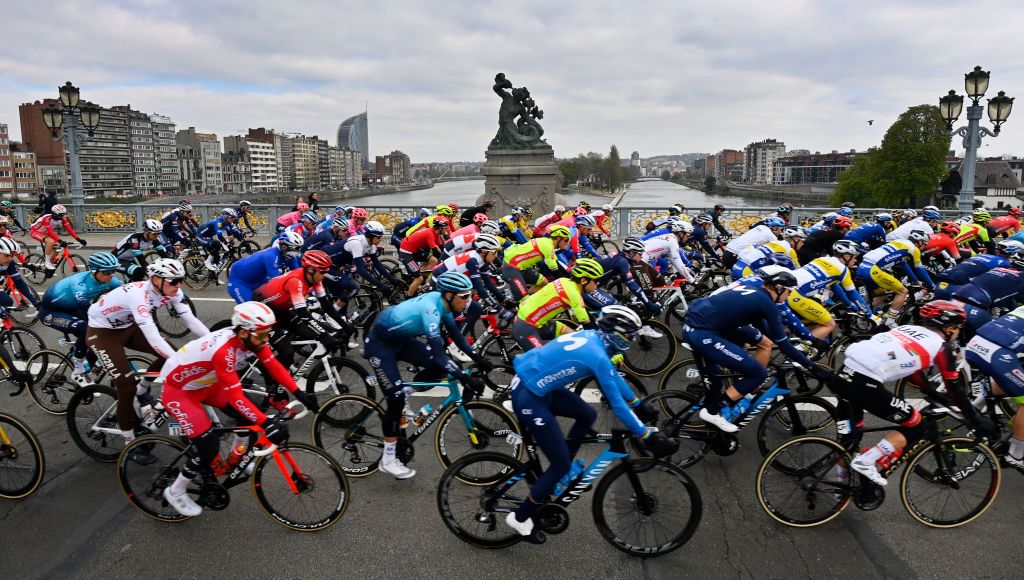 The pack takes the start of the LiegeBastogneLiege one day cycling race from Liege to Liege on April 25 2021 Belgium OUT Photo by ERIC LALMAND Belga AFP Belgium OUT Photo by ERIC LALMANDBelgaAFP via Getty Images