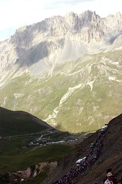 The Alpine mountains are beautiful for some bike racing action.