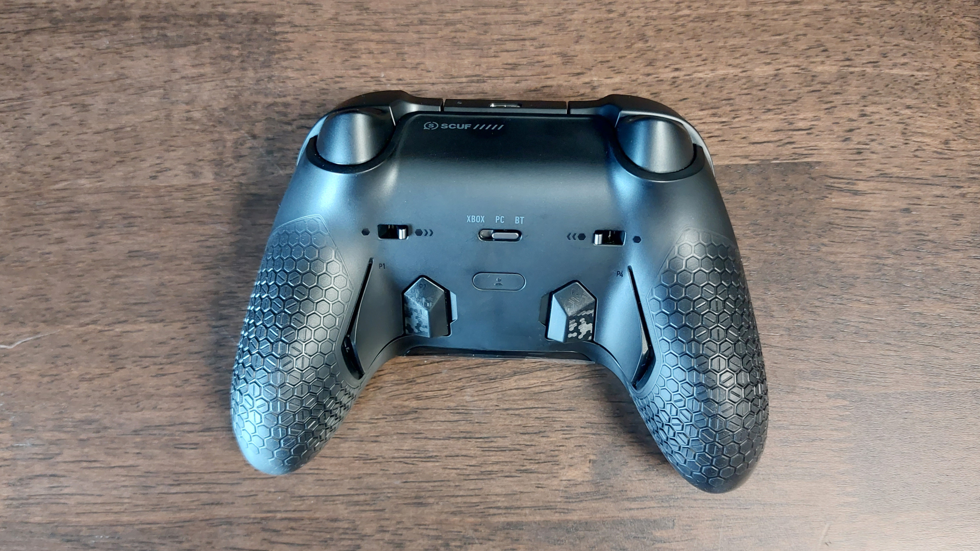 The Scuf Valor Pro wireless controller seen from various angles.