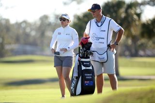 Hannah Green chats to her caddie