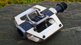 Crankbrothers Mallet Trail pedal on a rock