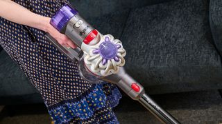 Dyson V8 vacuum cleaner in use