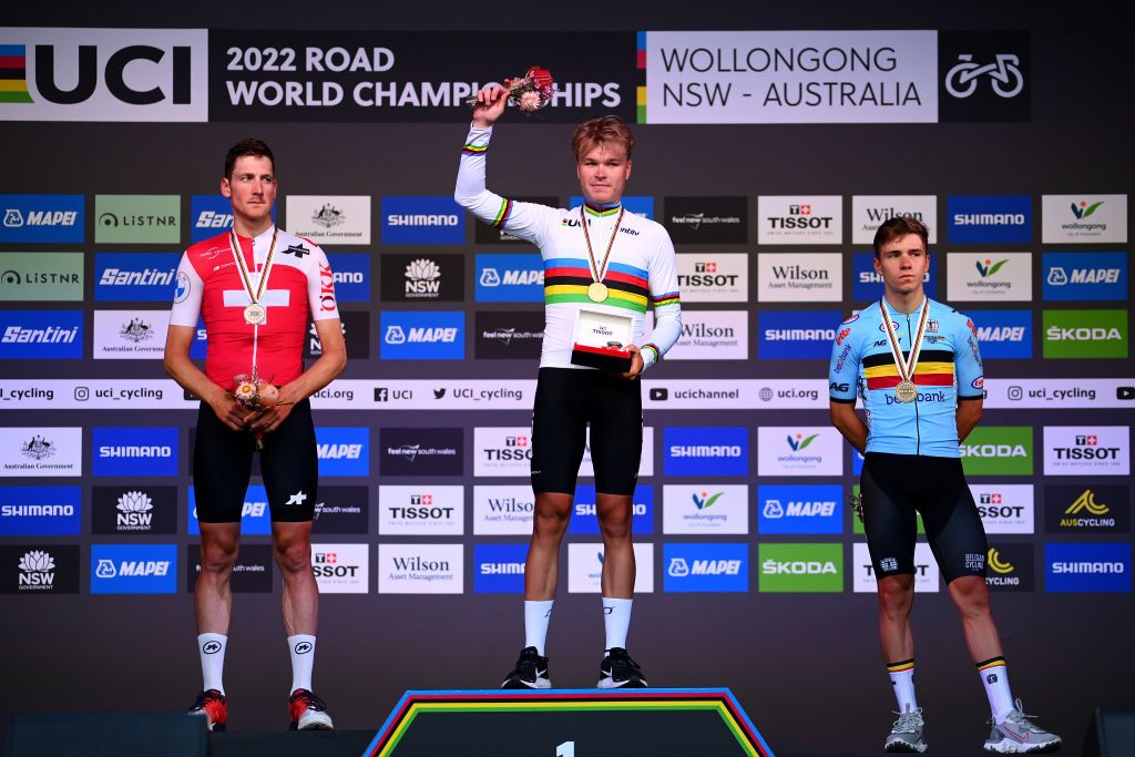 WOLLONGONG AUSTRALIA SEPTEMBER 18 Silver medalist Stefan Kung of Switzerland gold medalist Tobias S Foss of Norway and bronze medalist Remco Evenepoel of Belgium pose on the podium during the medal ceremony after the 95th UCI Road World Championships 2022 Men Individual Time Trial a 342km individual time trial race from Wollongong to Wollongong Wollongong2022 on September 18 2022 in Wollongong Australia Photo by Tim de WaeleGetty Images