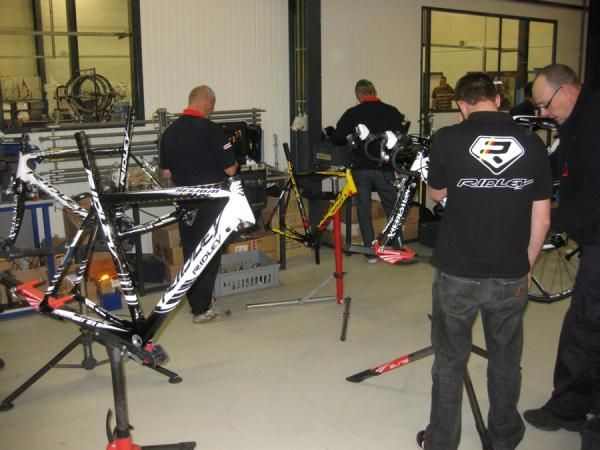 Team mechanics prep the new Vacansoleil race machines for the upcoming season.