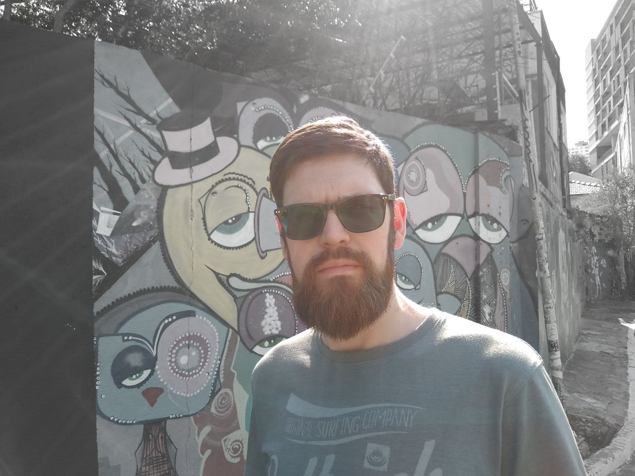This tool turns the background to black and white with a single tap, but there are still remnants of color in this example.