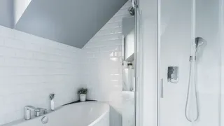 White bathroom with grey ceiling