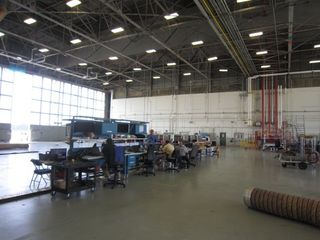 Global Hawk Engineers Inside Aircraft Hangar