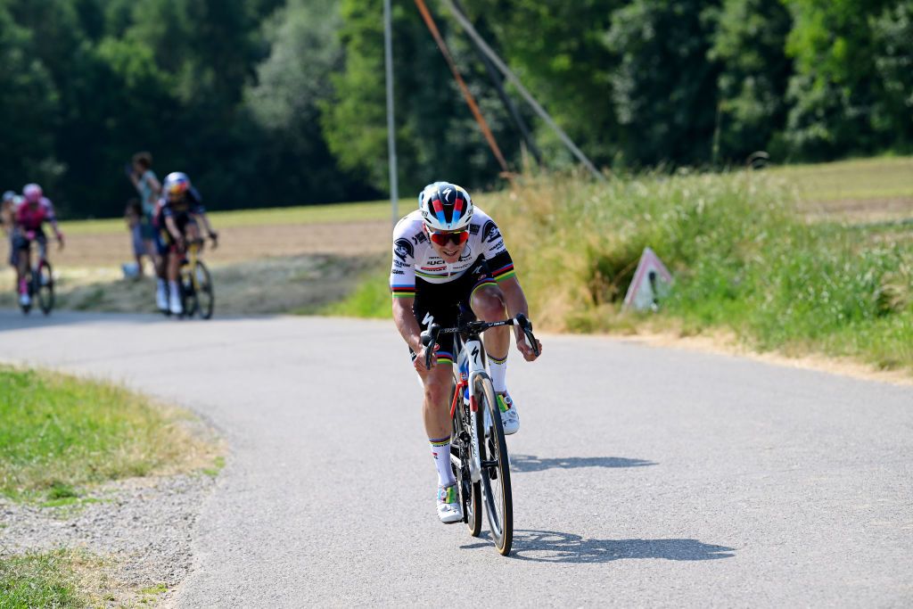 WEINFELDEN SWITZERLAND JUNE 17 Remco Evenepoel of Belgium and Team Soudal QuickStep attacks during the 86th Tour de Suisse 2023 Stage 7 a 1835km stage from Tbach to Weinfelden UCIWT on June 17 2023 in Weinfelden Switzerland Photo by Dario BelingheriGetty Images