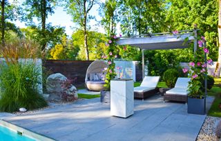 neolith fire on patio with pergola