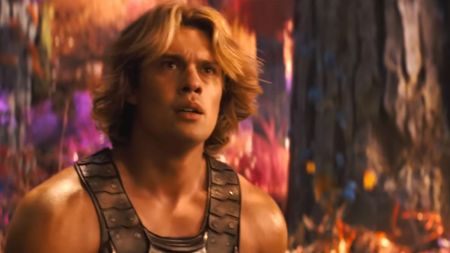 Nicholas Galtzine as He-Man in Masters of the Universe, looking confused. 