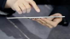 Tecno Phantom Ultimate G Fold Concept phone unfolded in someone's hands