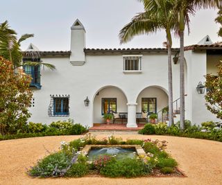 exterior of spanish colonial revival home with white stucco