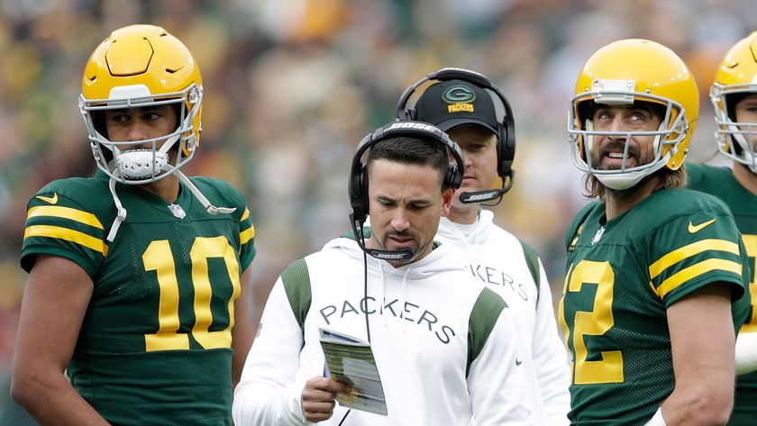 Jordan Love and Matt LaFleur in conversation with Aaron Rodgers when he was a Green Bay Packers player on October 24, 2021