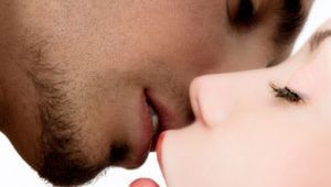 girl and guy kissing