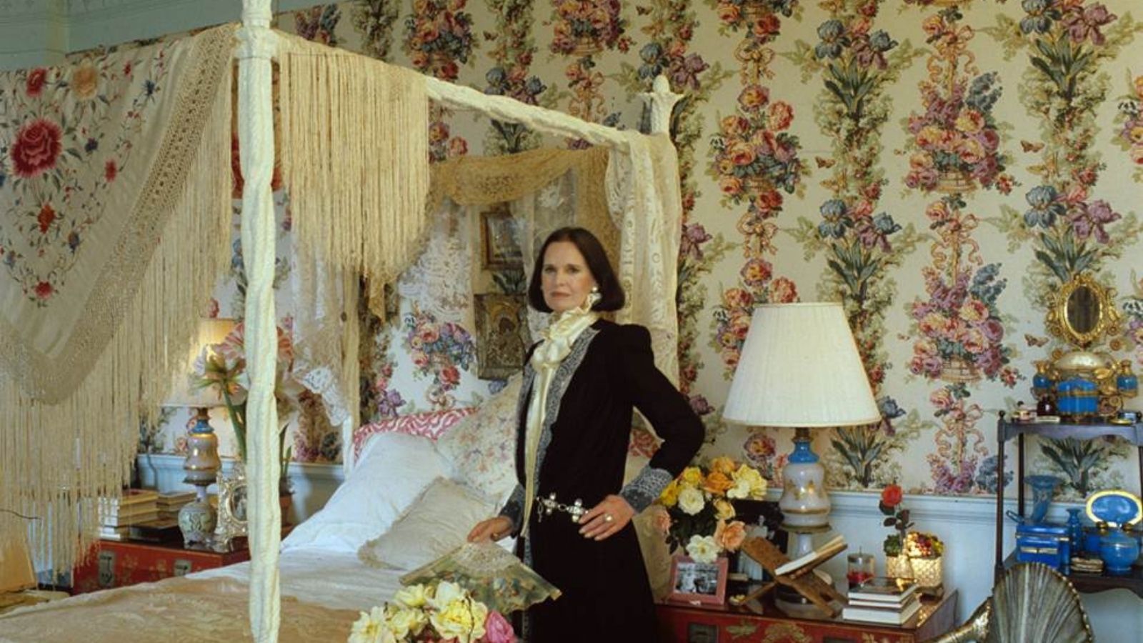 Antique Lace, Floral Wallpaper, and A Spanish Shawl: Gloria Vanderbilt's '80s Bedroom Is a Masterclass in Modern Heritage Interiors