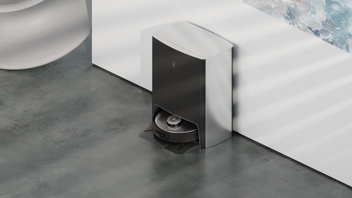 Ecovacs Deebot X1 Omni robot vacuum in it&#039;s charging station