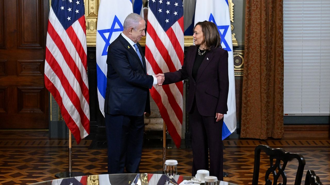 Benjamin Netanyahu, Israel&#039;s prime minister, left, and US Vice President Kamala Harris shake hands during a meeting in the Vice President&#039;s Ceremonial Office in Washington, DC, US, on Thursday, July 25, 2024