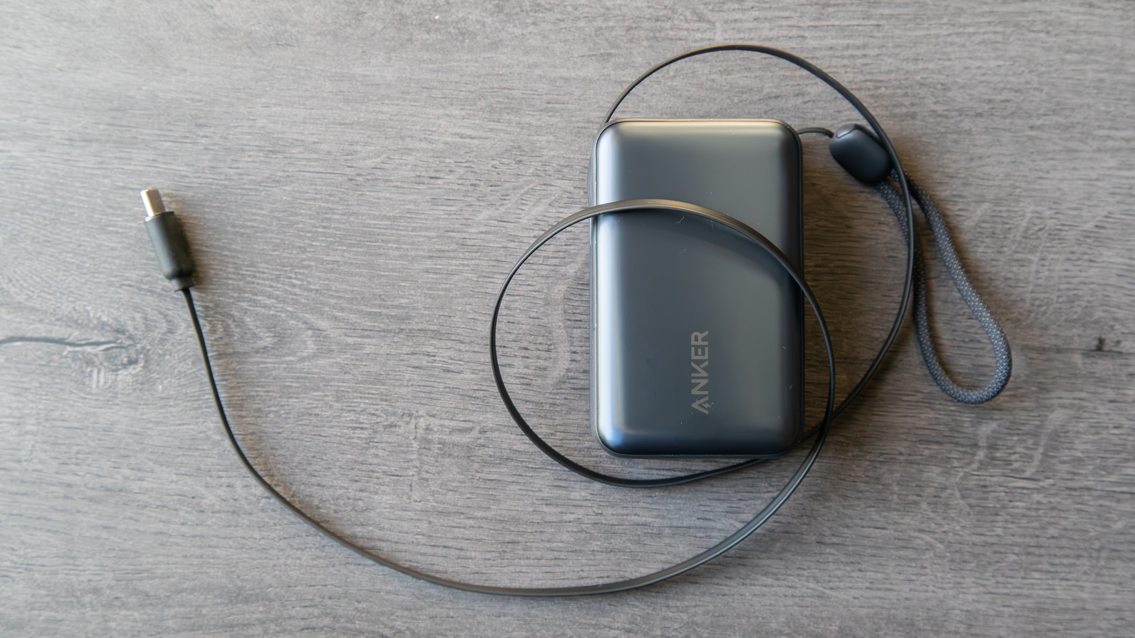 The Anker Nano Power Bank (A1638) with the cable fully extended