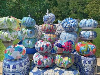 A pile of painted pumpkins