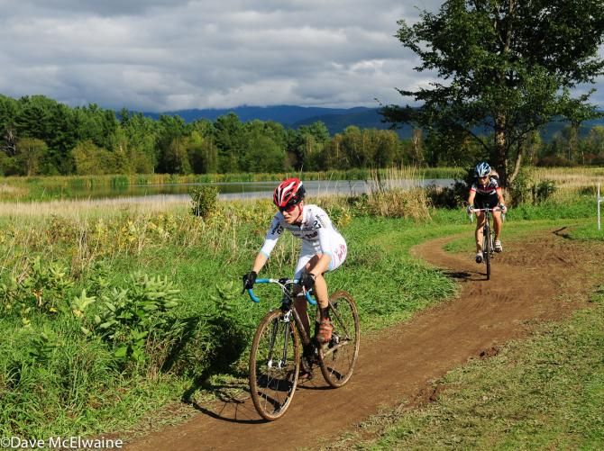 Mo Bruno-Roy (Bob's Red Mill p/b Seven Cycles) riding in fourth position near the lake